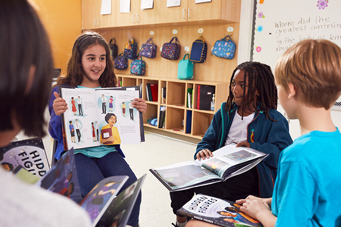 A&L Socratic Seminar circle discussion student showing book 2 A&L Socratic Seminar circle discussion student showing book 2